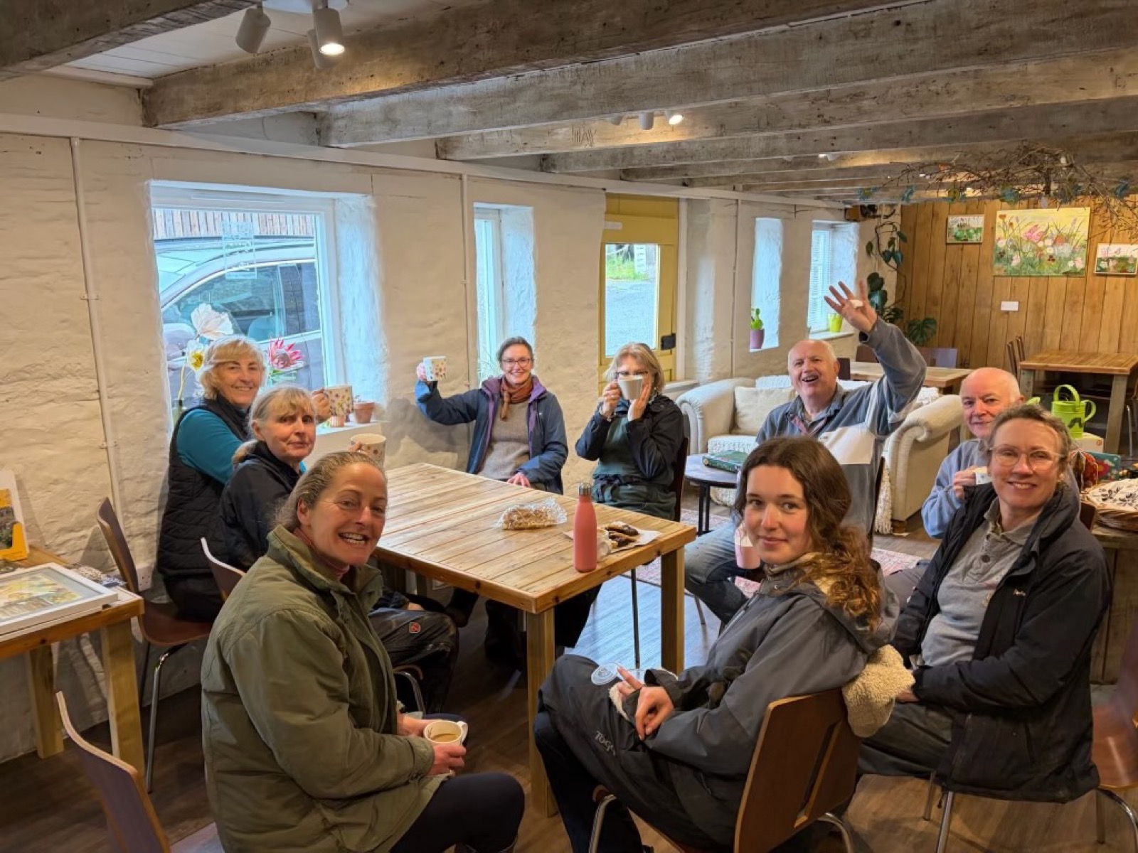 Our volunteer team sharing a break together around the table